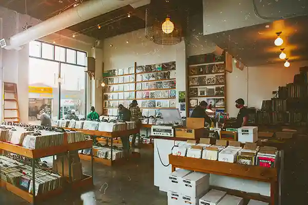 Crates of vinyl and CDs in the Recursive Records East London shop